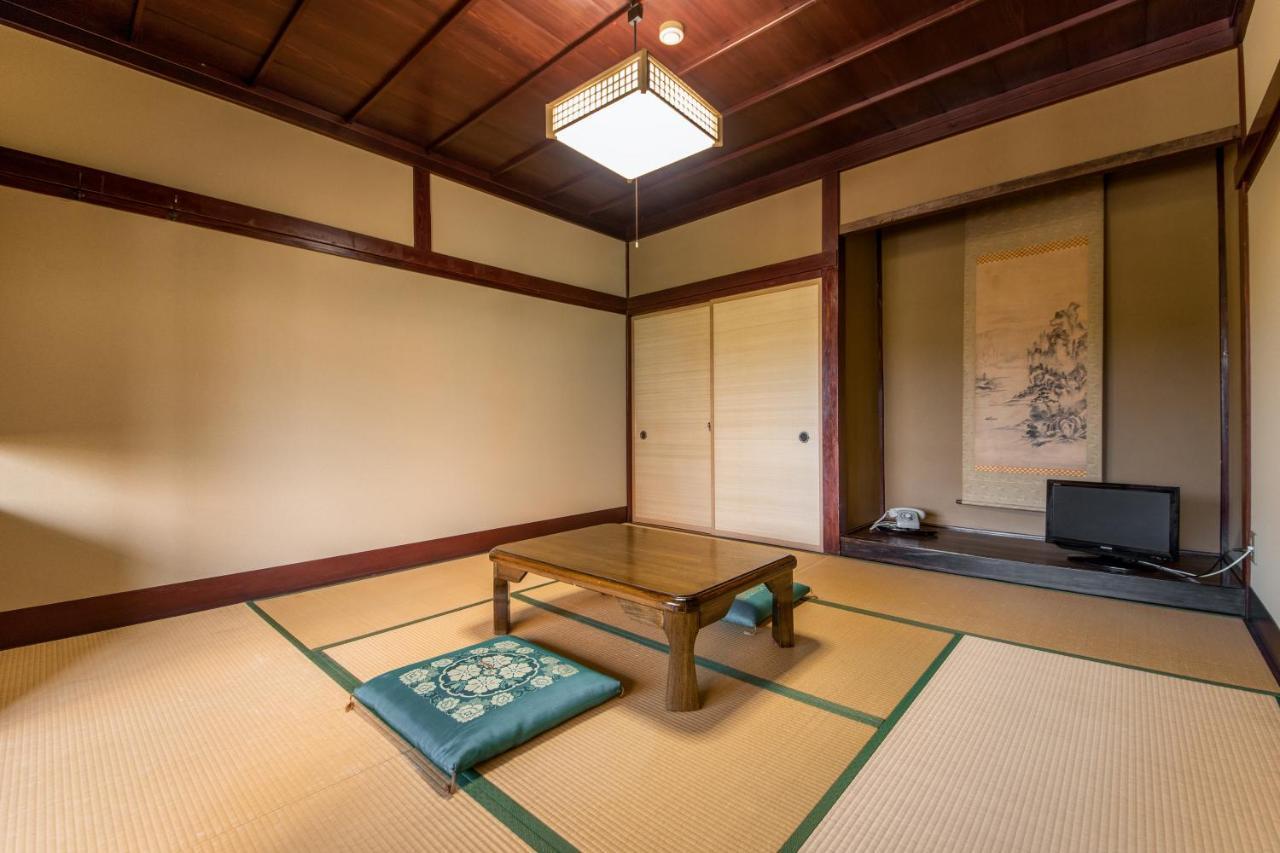 Kadokyu Ryokan Такаока Экстерьер фото
