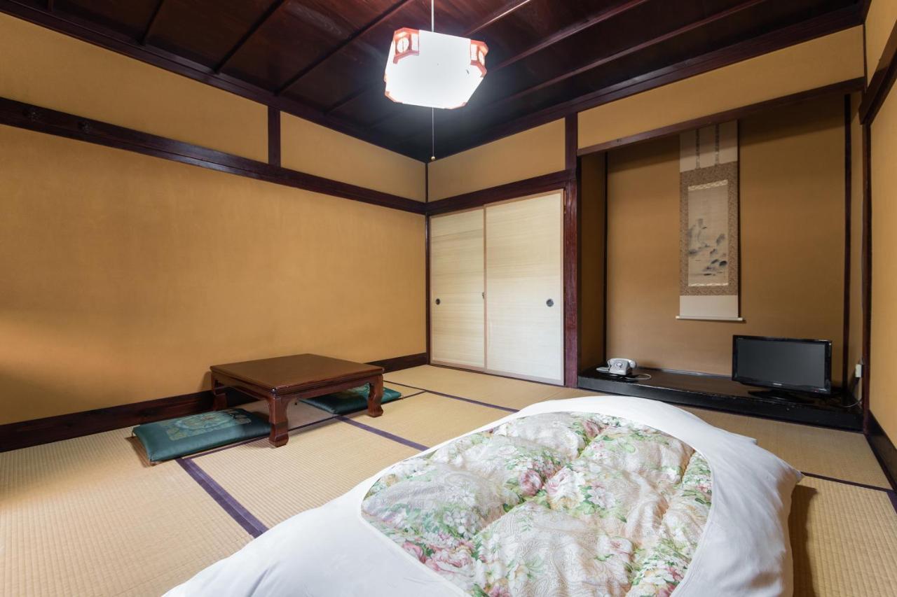 Kadokyu Ryokan Такаока Экстерьер фото